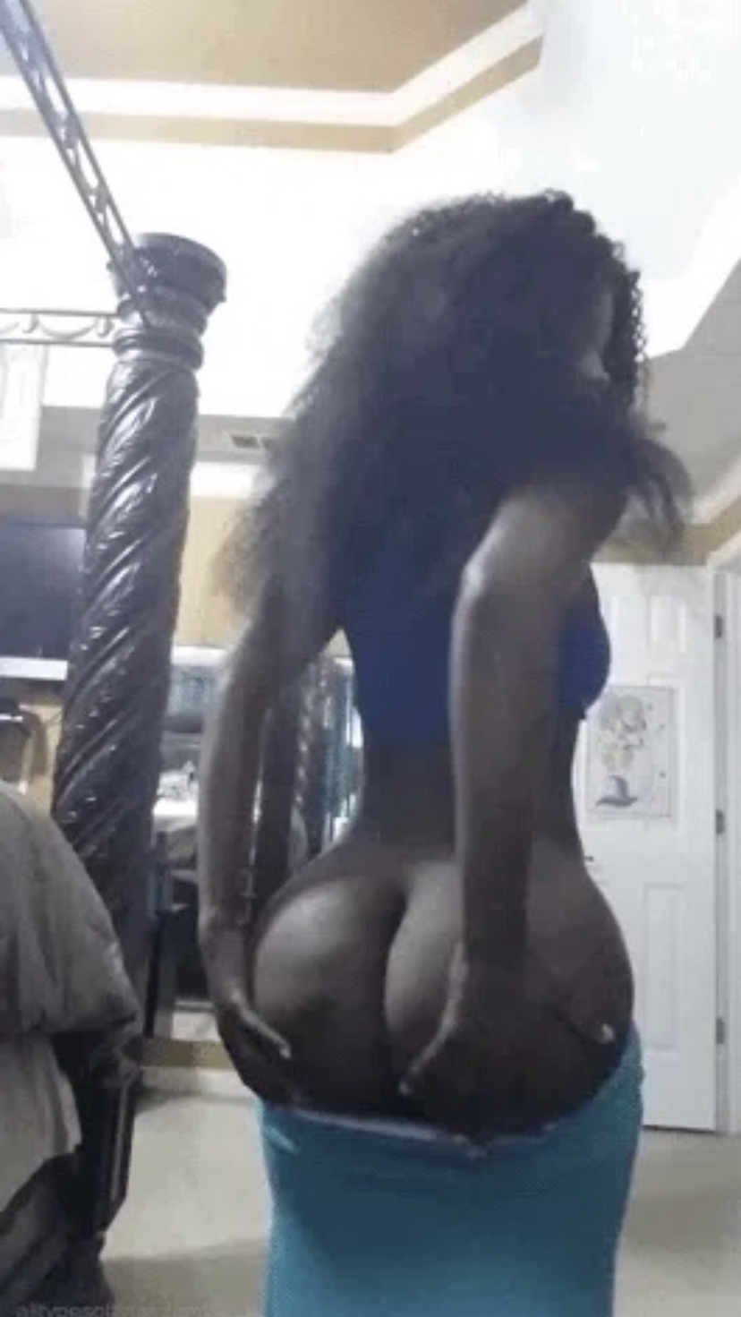Ebony girl shaking fat ass in short dress